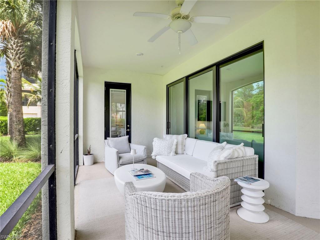 Sunroom / solarium featuring an outdoor living space and ceiling fan