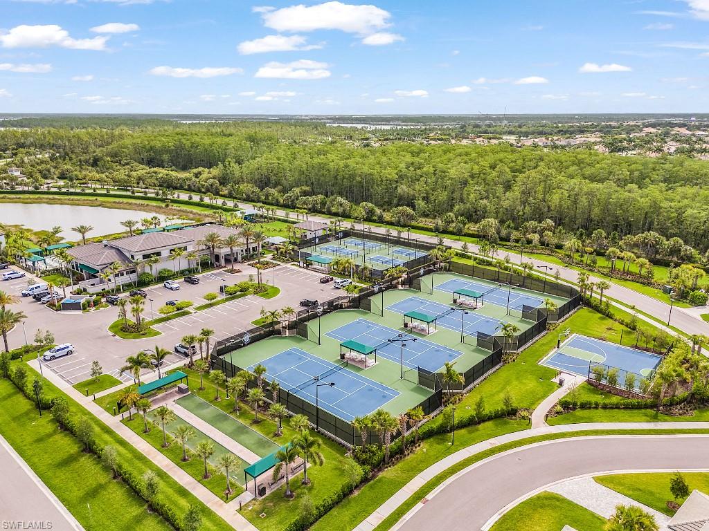 Aerial depiction of the community amenity complex, featuring multiple tennis courts, bocce ball courts, a basketball court, and a clubhouse building