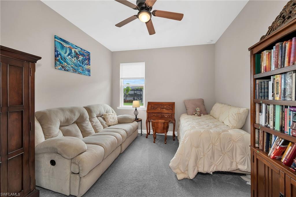 Neutral-toned walls with gray carpeting throughout