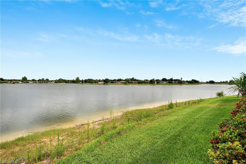 Expansive water frontage with a sandy edge