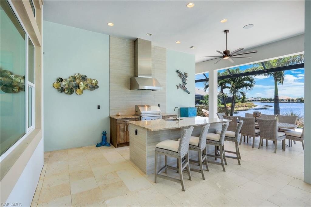 Outdoor entertaining made easy with a grille and an under-counter refrigerator and freezer