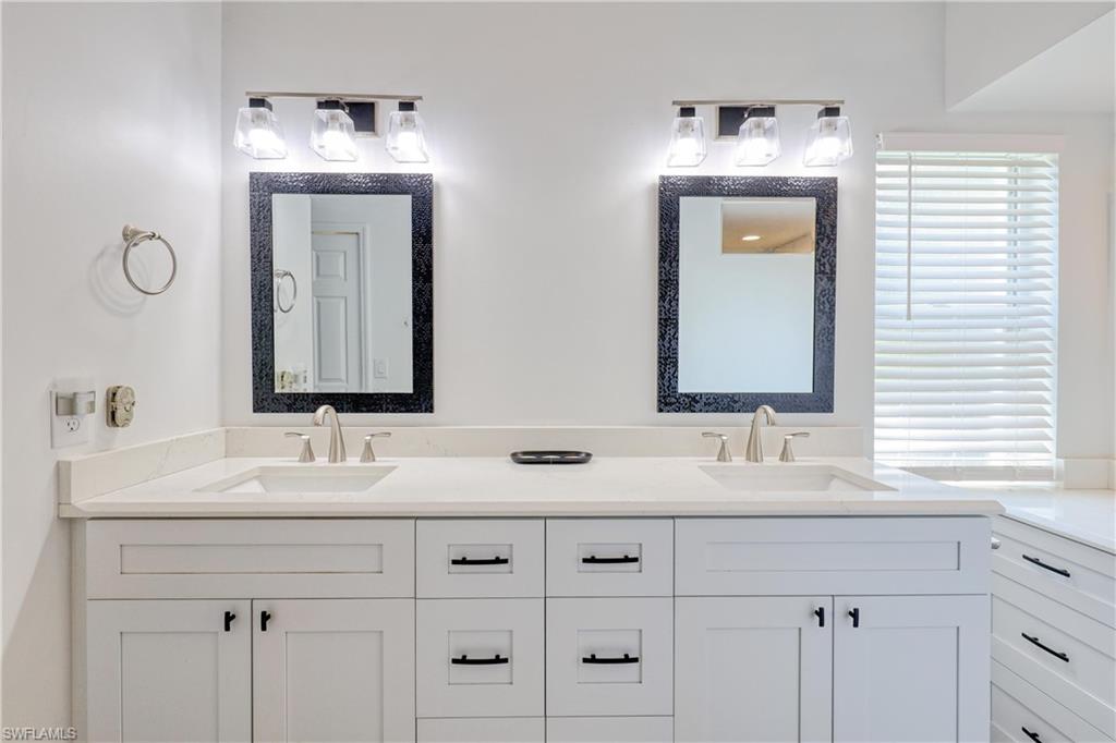 Primary Bathroom with Dual Sinks and Make-up area