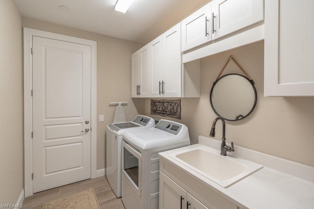 Laundry room with utility tub