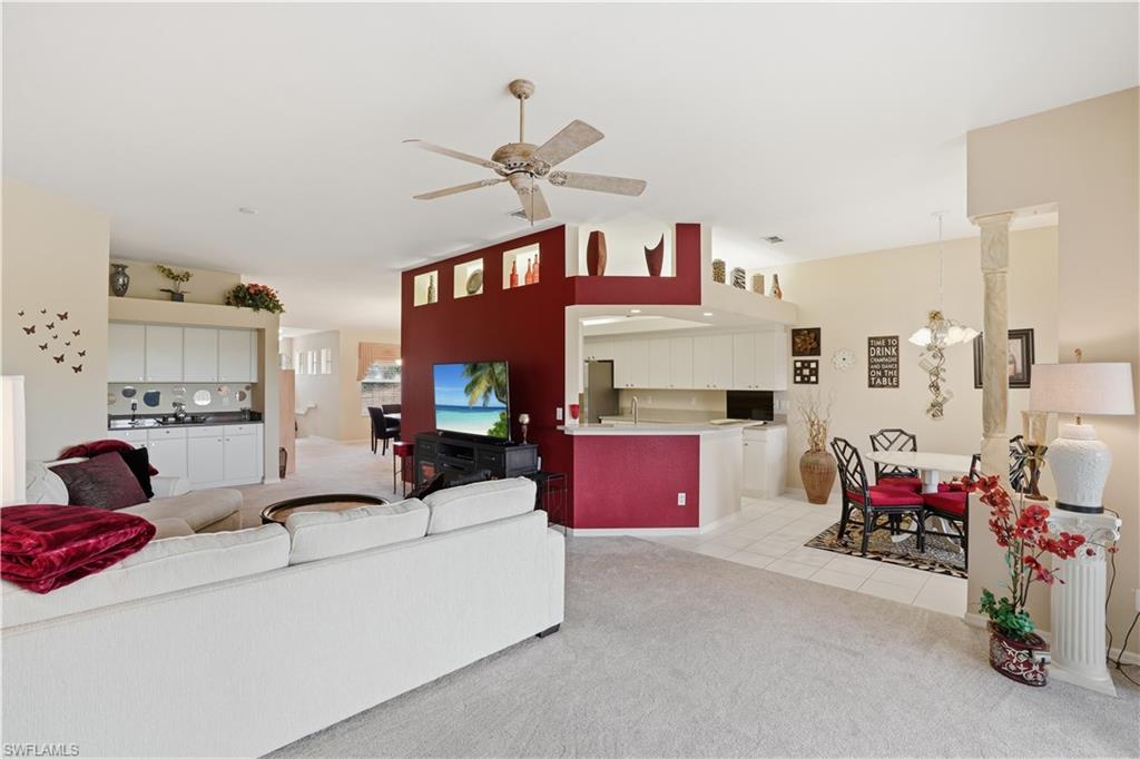 This home boasts volume ceilings and an open floorplan.