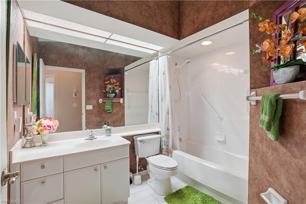 Guest bathroom with tub/shower combination.