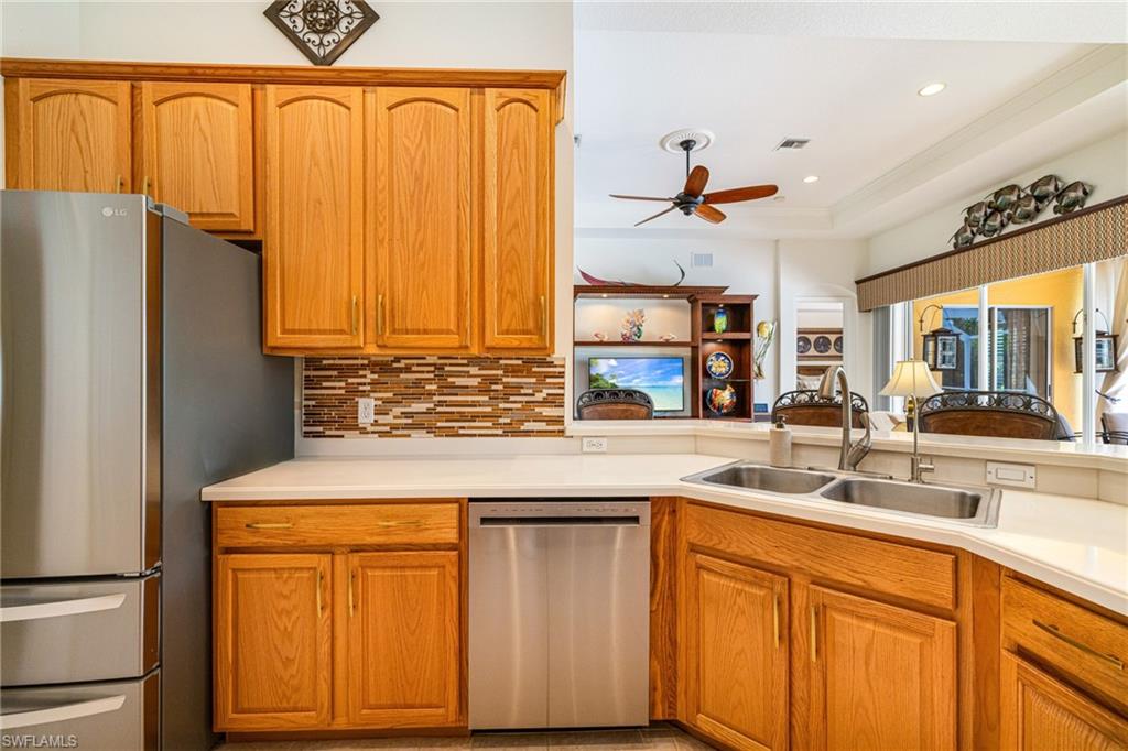 kitchen sharing a view of the great room and outdoors