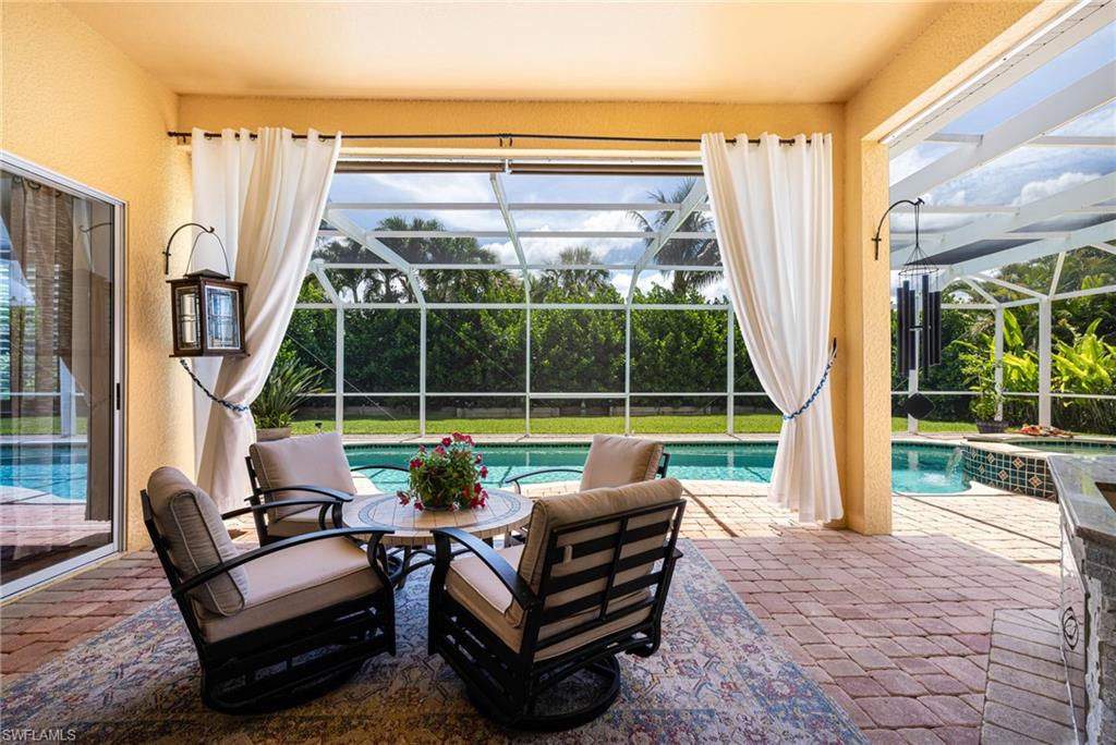 Pool/patio sitting area with private drapery