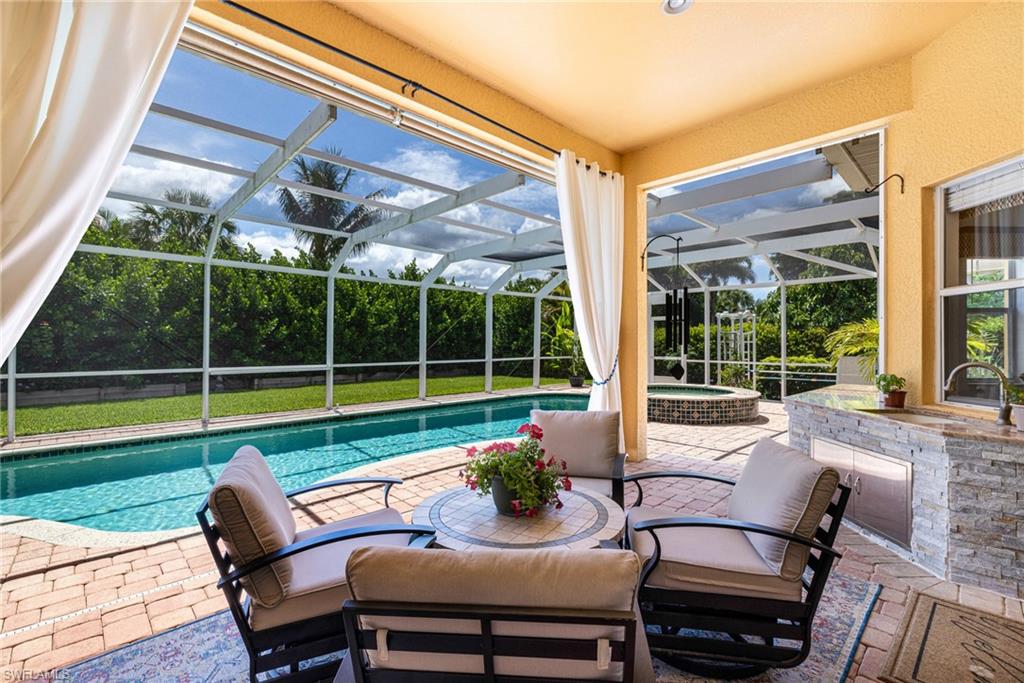 Pool/patio sitting area with private drapery