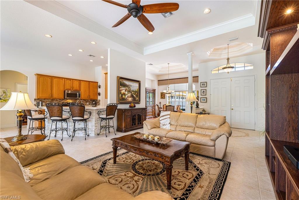 Living room with eat in kitchen bar