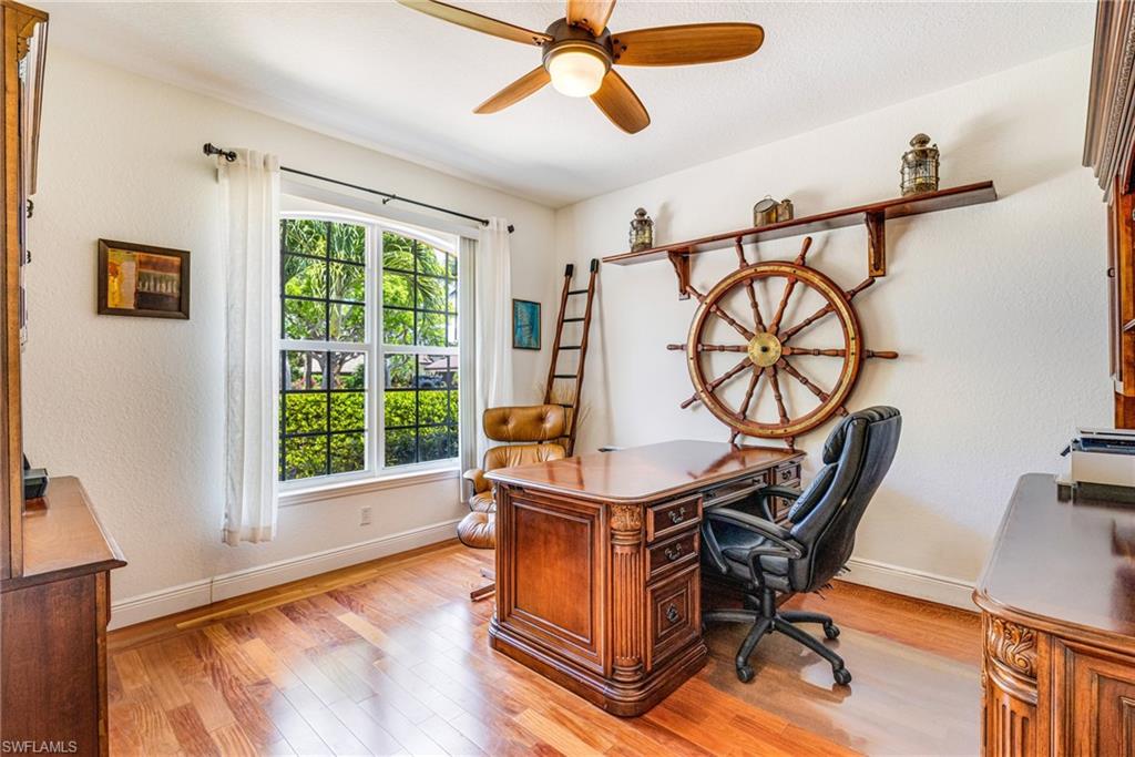Home office space with beautiful wood floor
