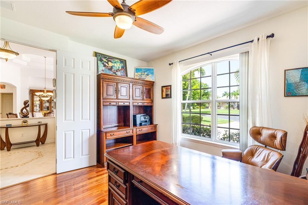 Home office with wood floor