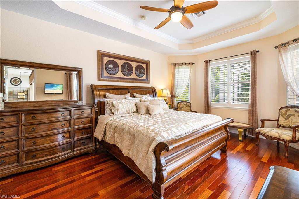 Primary bedroom with luxury wood floor
