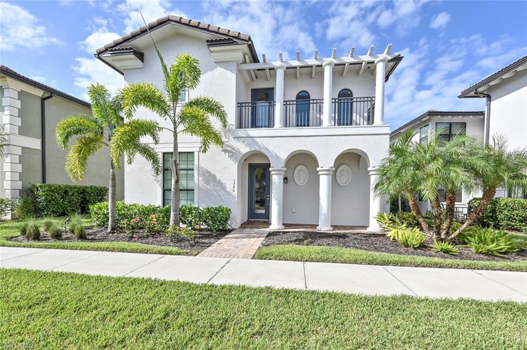 Front of the house.... Naples blue skies