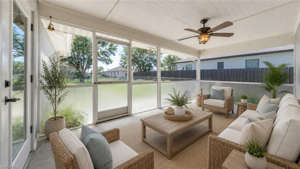 Virtual Screened patio featuring a beadboard ceiling with a ceiling fan, concrete flooring, and multiple glass-paned doors
