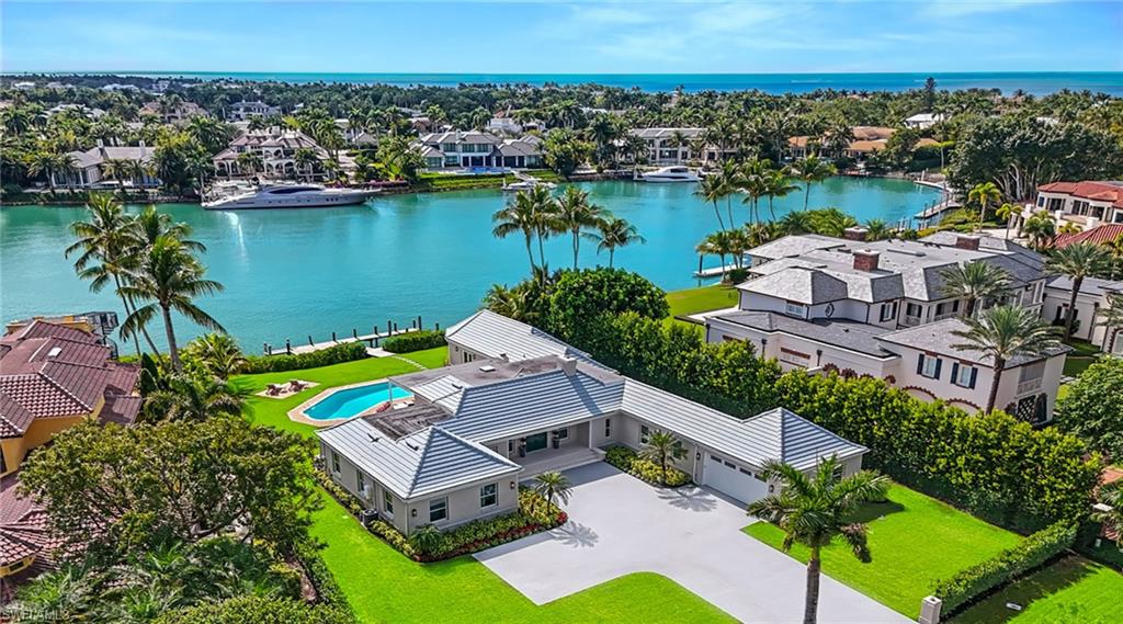 Aerial view of residential area with a nearby body of water