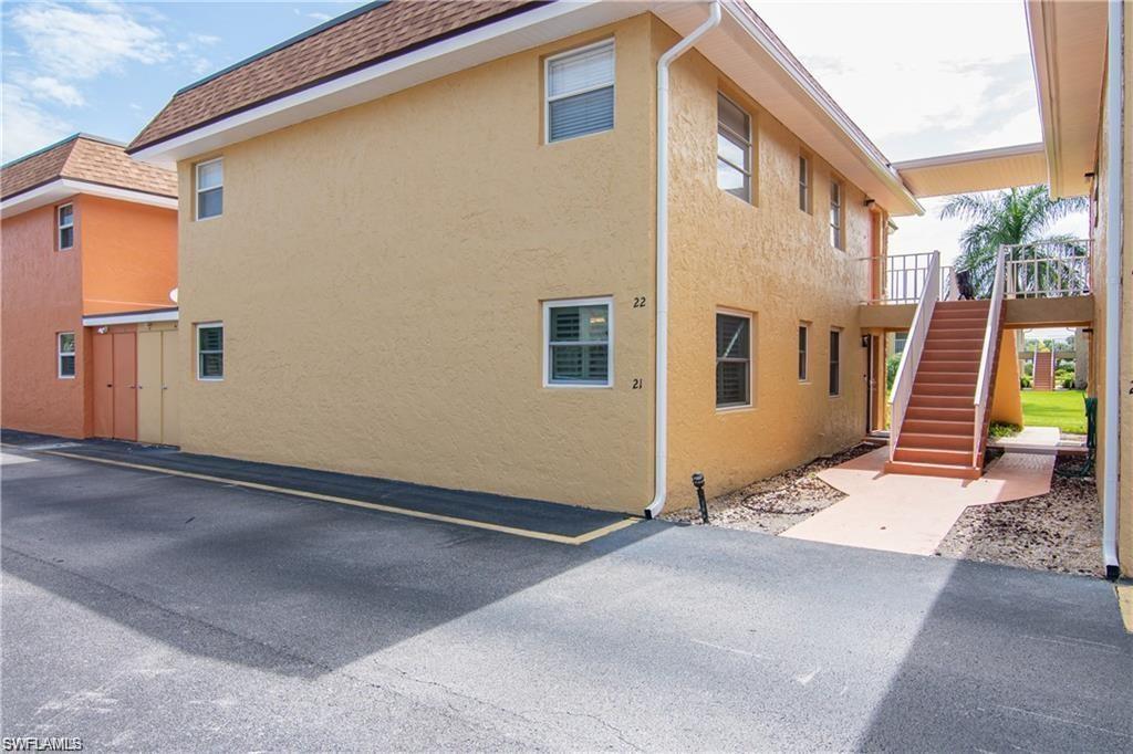 xterior view with assigned parking and convenient building access.