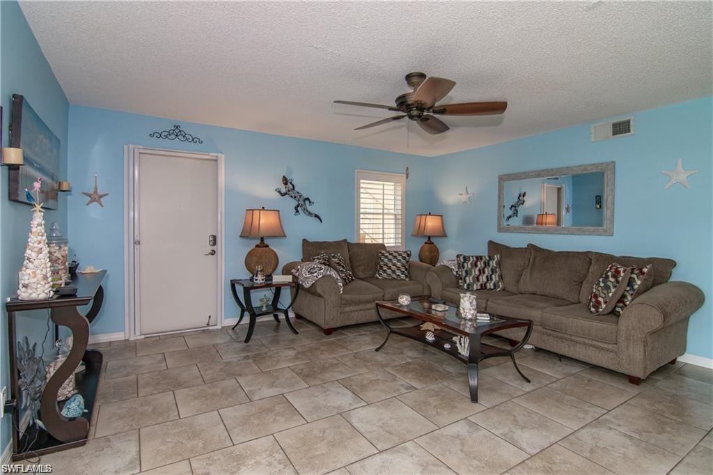 Spacious living room with coastal accents and an open layout.