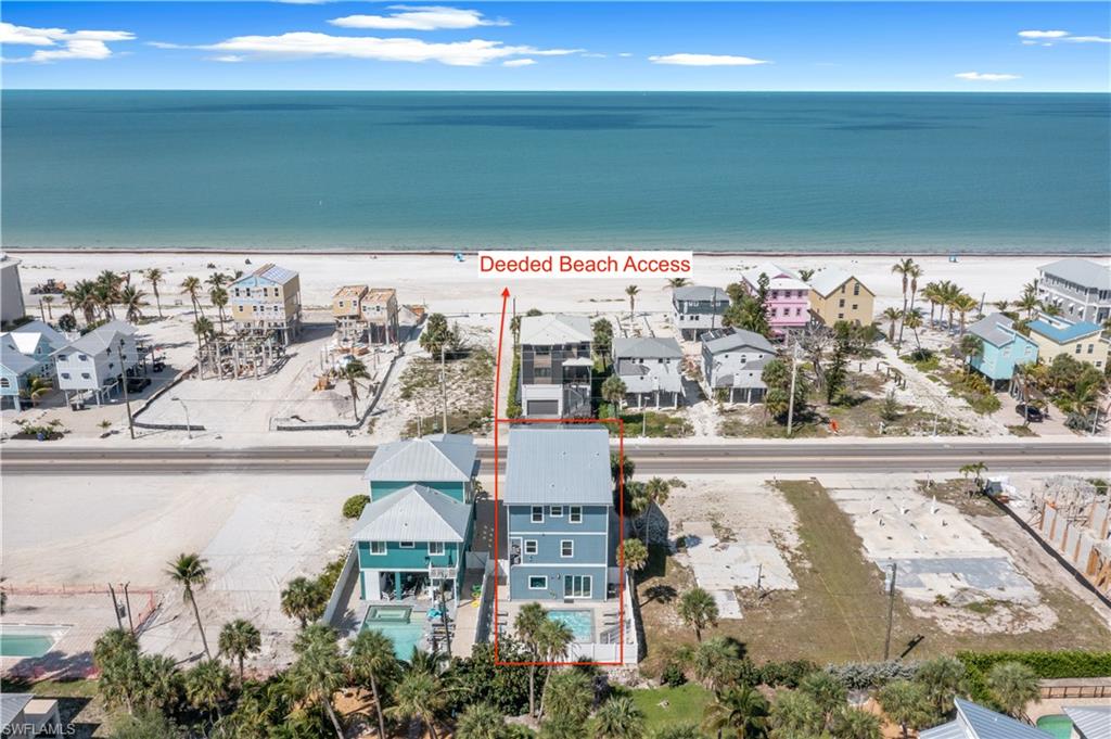 Direct beach access, a private swimming pool, and a multi-story design