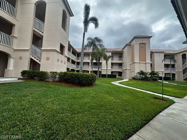 Surrounding community featuring a yard