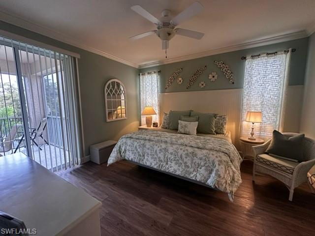 Bedroom with a ceiling fan, ornamental molding, access to outside, and wood finished floors