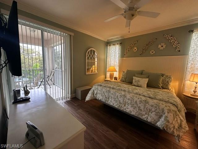 Bedroom featuring wood finished floors, access to exterior, crown molding, baseboards, and ceiling fan