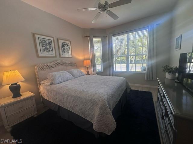 Bedroom featuring baseboards and a ceiling fan
