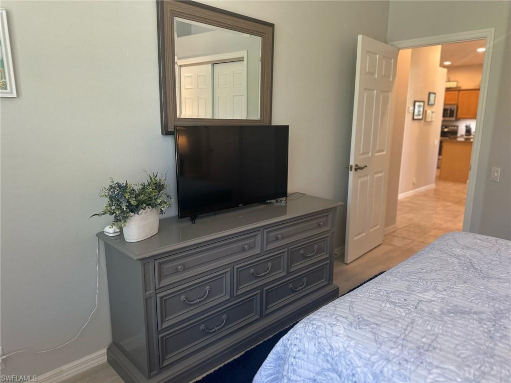 Bedroom with baseboards