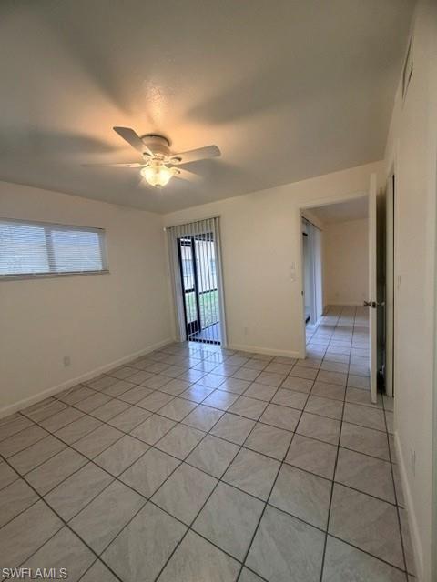 Neutral-toned ceramic tile flooring extending throughout the space