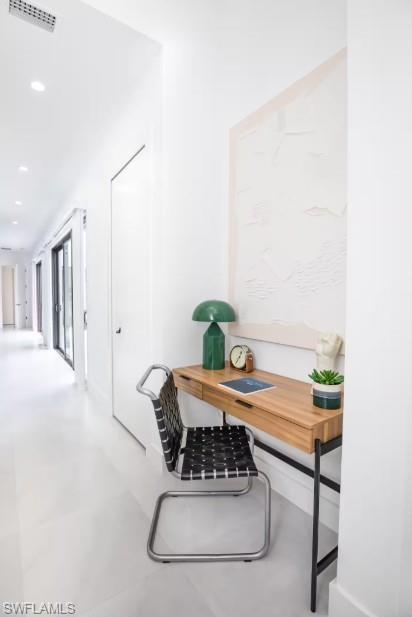 Office desk in a hallway