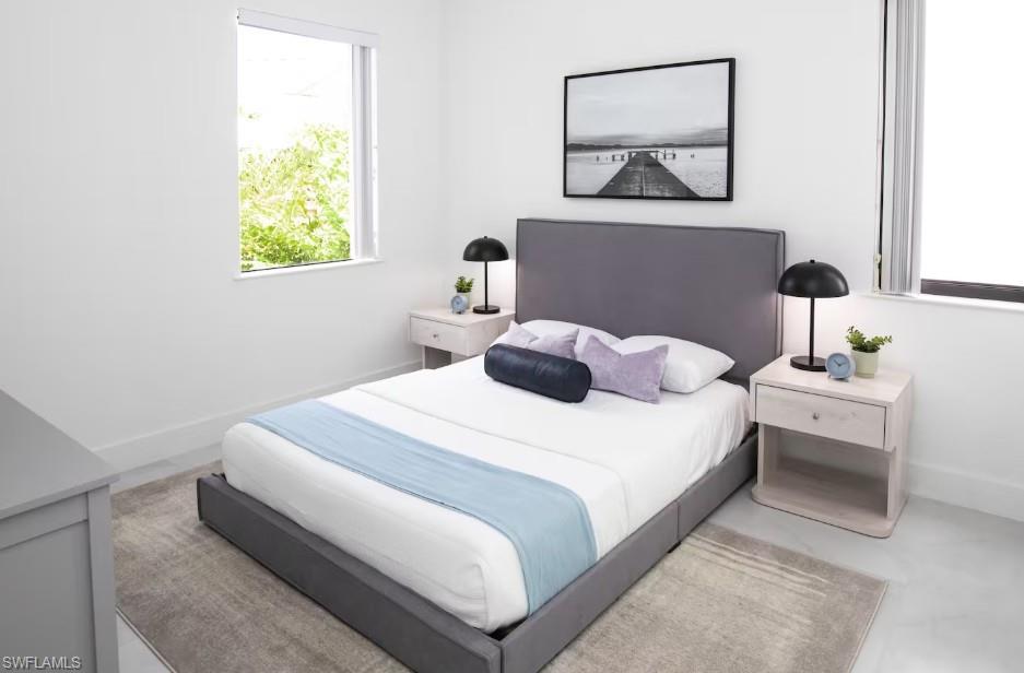 Bedroom with a swimming pool view