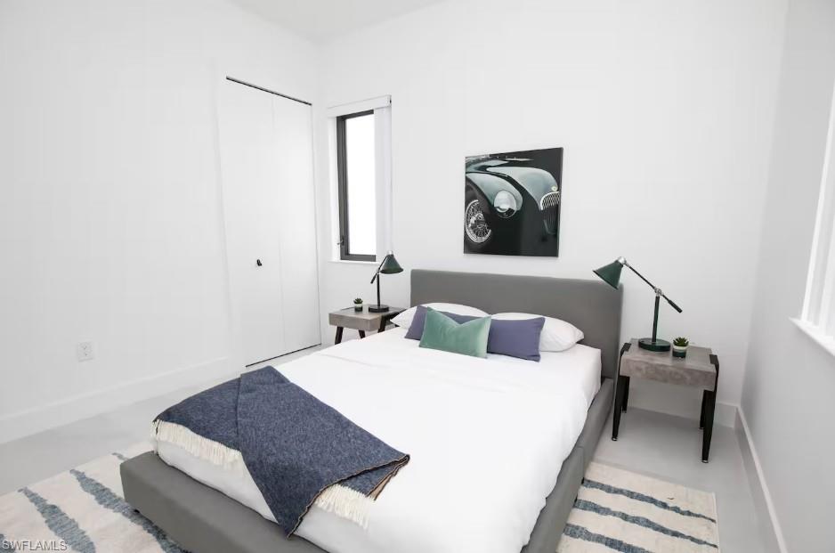 Bedroom with a front yard view