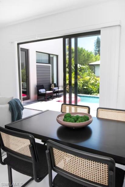 Dining area with beautiful swimming pool view