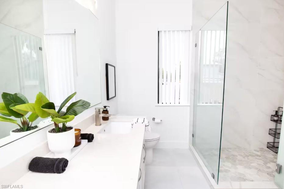 Master bathroom with a shower