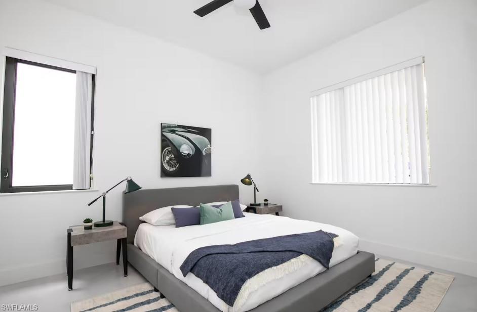 Bedroom with a front yard view