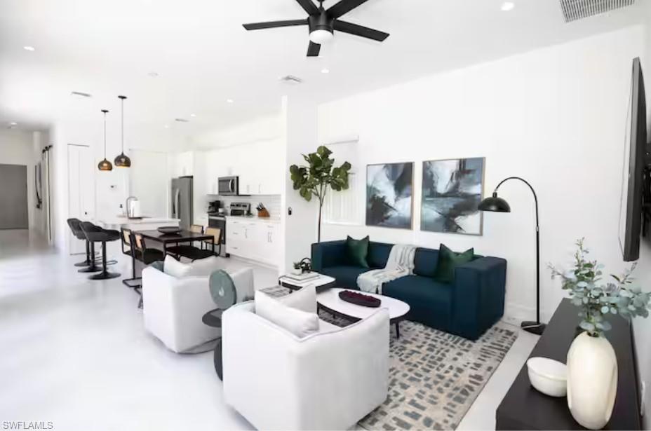 Open-concept living space, kitchen and dining area