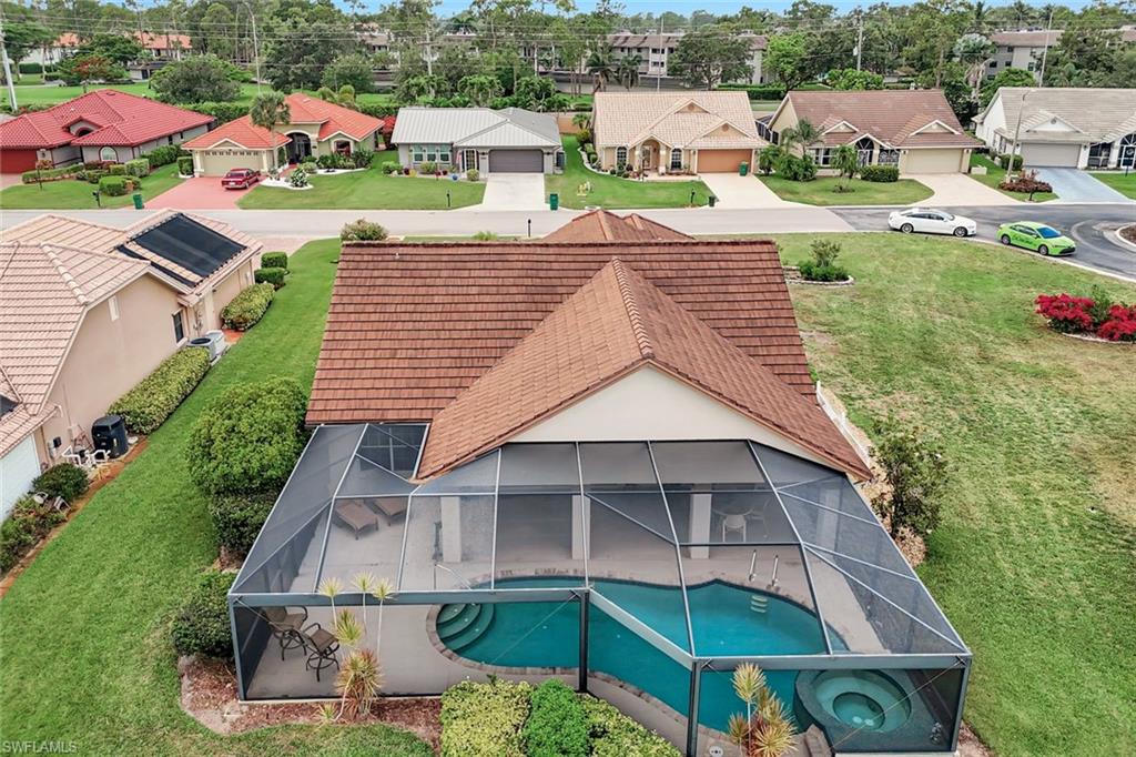 Aerial view of residential area with a pool area