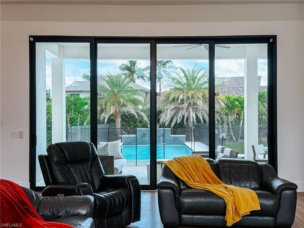 10' Sliding Glass Door configuration with Clear view to the Pool and Exterior water feature
