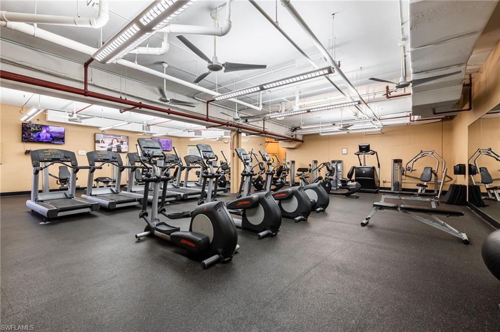 Workout area featuring ceiling fan
