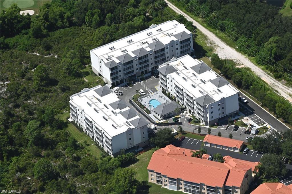 Bird's eye view with a wooded view