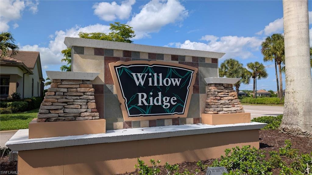Willow Ridge community entrance sign featuring stacked stone accents and varied tile patterns