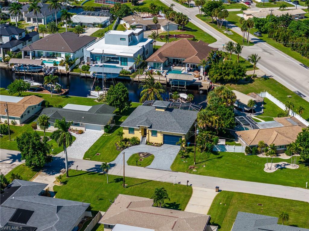 Aerial perspective showcasing a residential area with waterways