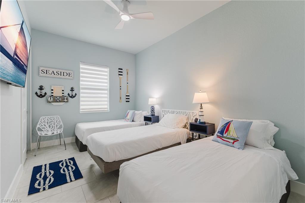 Bright room with cool-toned wall paint and tile flooring