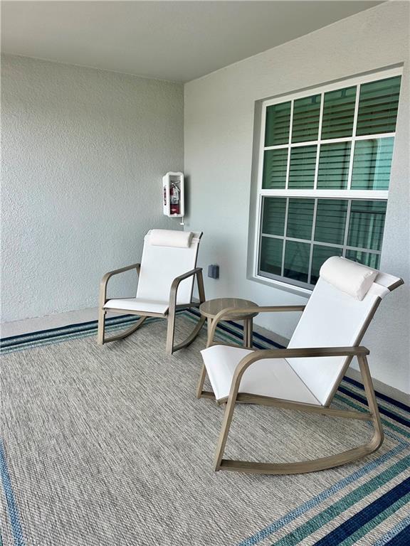 View of patio / terrace with a balcony