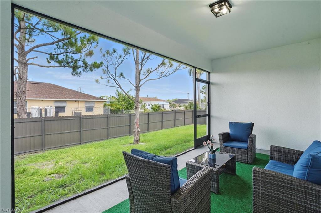 Sunroom featuring an outdoor hangout area