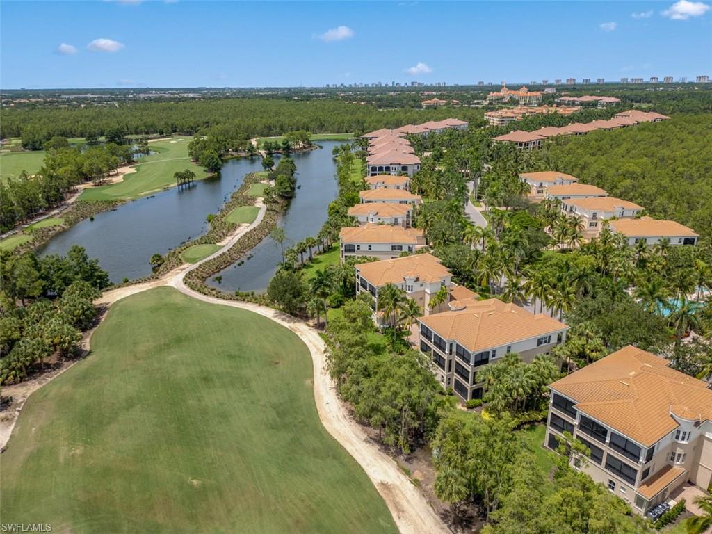Bird's eye view of back of property on golf course
