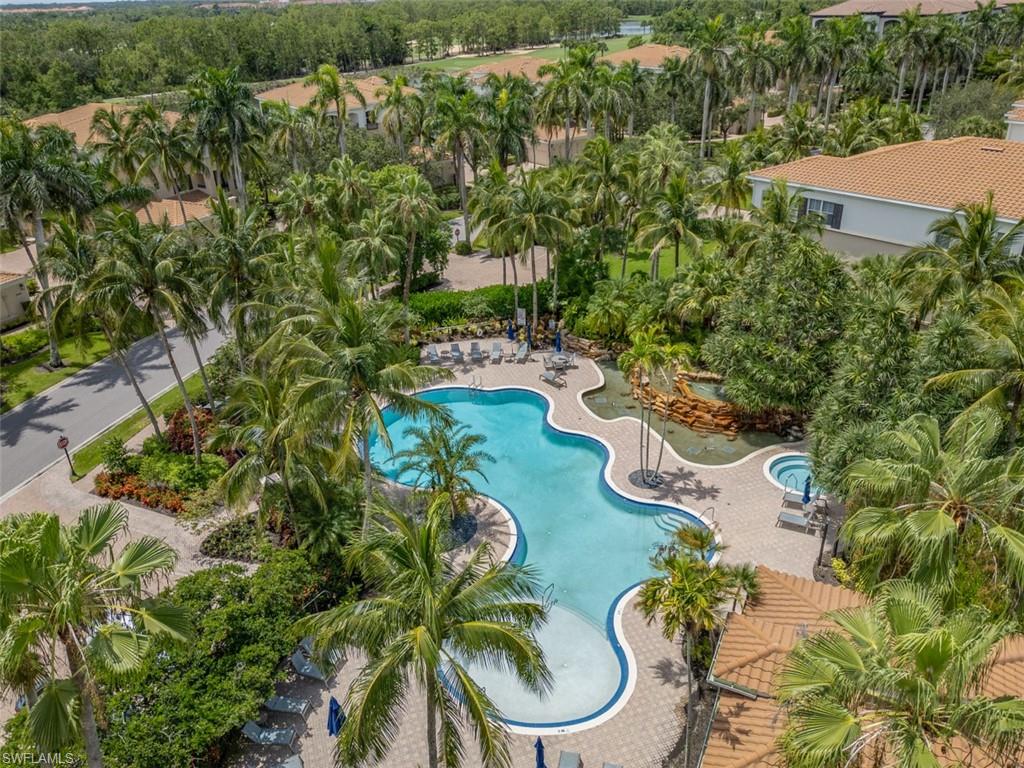 Community pool with view of greenery