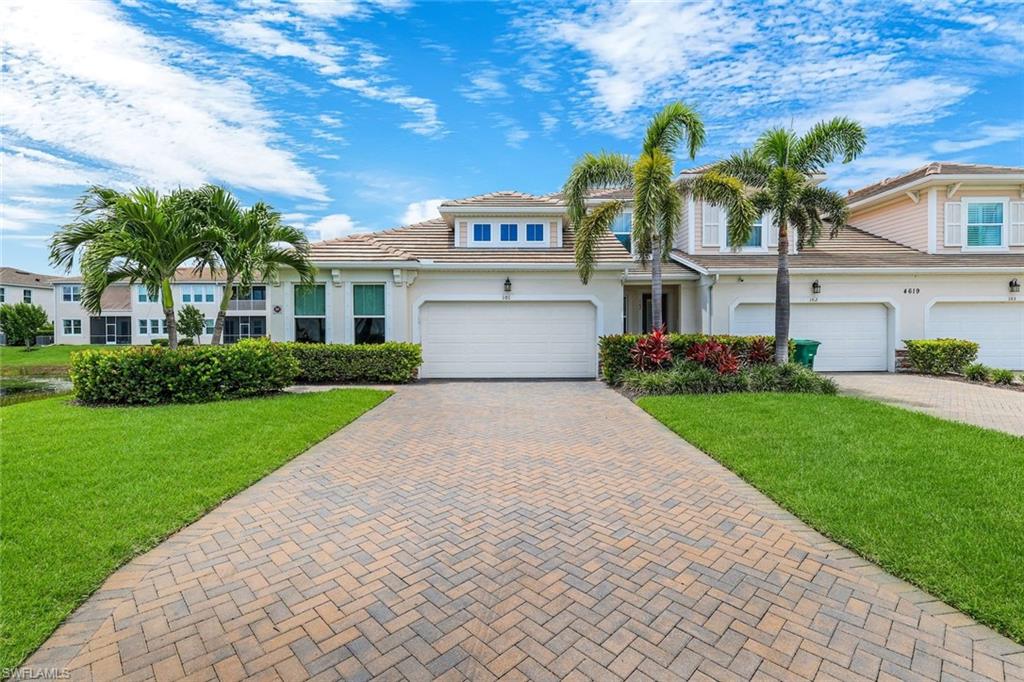 Gorgeous single story 2 plus den end unit with 2 car garage.