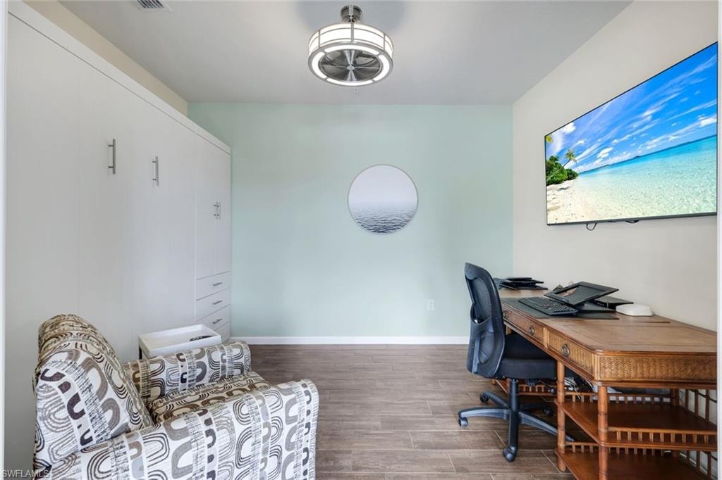 Den space that also can function as an additional bedroom for guests with built in Murphy Bed