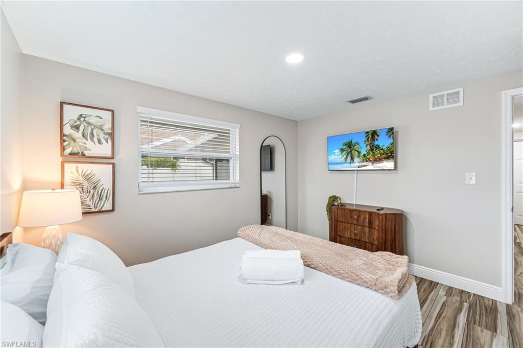 Bedroom featuring hardwood / wood-style floors