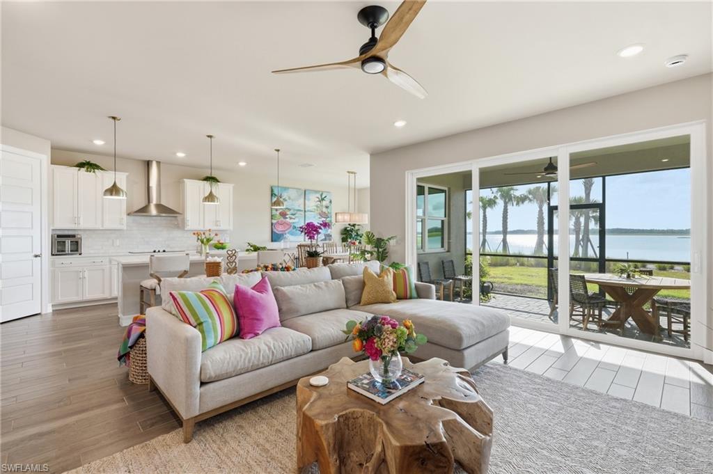 Open-concept living area with wood-finish flooring